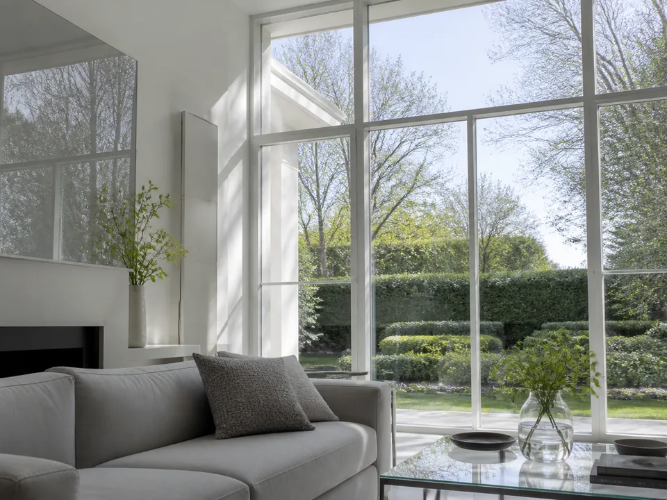 Sunlight passing through large clear residential windows